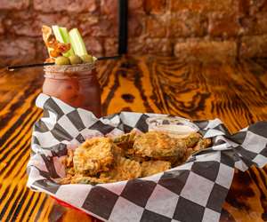 Fried pickles and a bloody mary cocktail