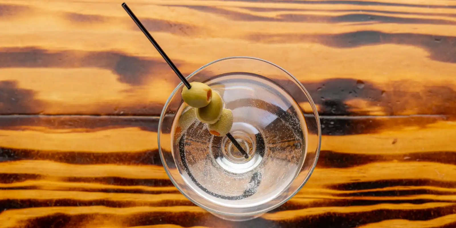 martini with olive garnish